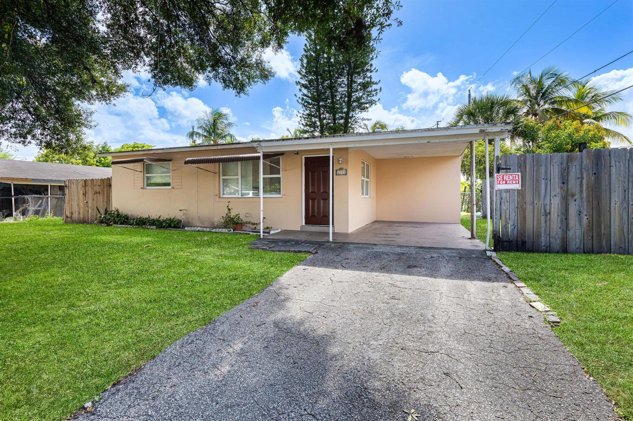 Centrally Located! This light filled home features newer Hurricane-Impact Windows, granite countertops, tile flooring, and a spacious laundry room. Sitting on a huge lot with room to expand, it's the perfect starter or investment property. Close to highways, shopping, dining, and more!