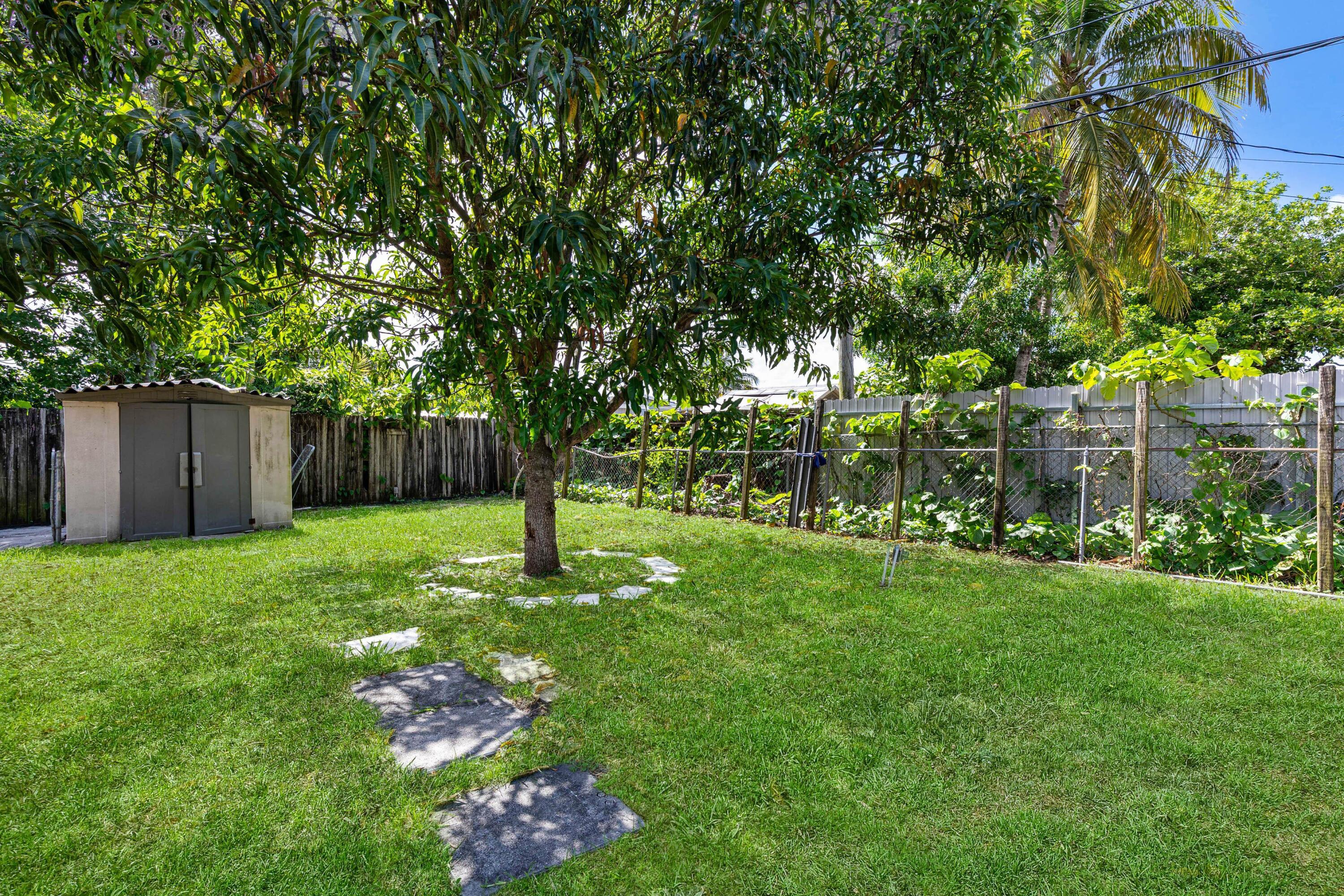 Centrally Located! This light filled home features newer Hurricane-Impact Windows, granite countertops, tile flooring, and a spacious laundry room. Sitting on a huge lot with room to expand, it's the perfect starter or investment property. Close to highways, shopping, dining, and more!