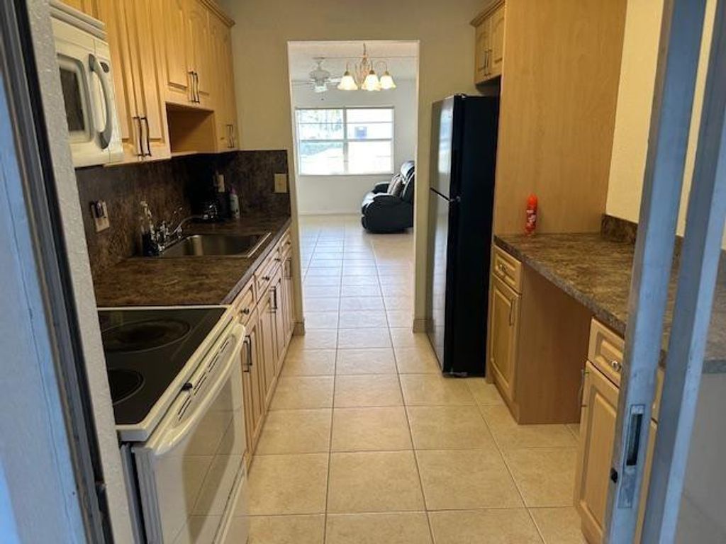 Photo of 7705 NW 5th Court #104, Margate, FL 33063 (MLS # F10545752)