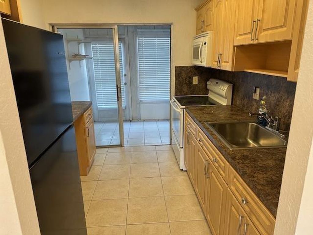 Photo of 7705 NW 5th Court #104, Margate, FL 33063 (MLS # F10545752)