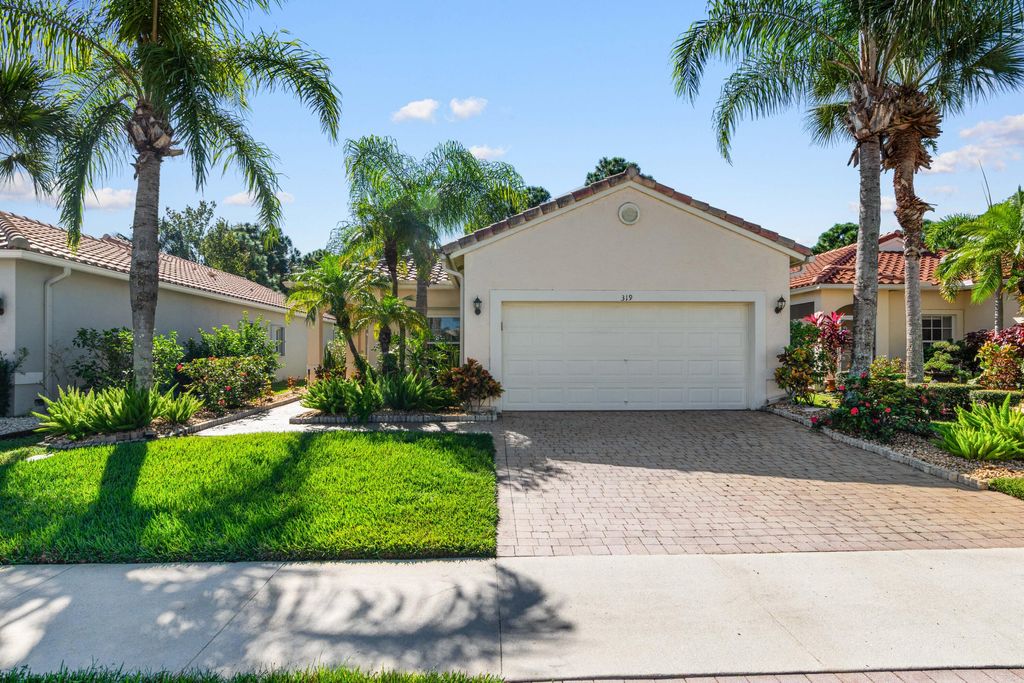 Photo of 319 NW Treeline Trace, Port Saint Lucie, FL 34986 (MLS # R11136400)