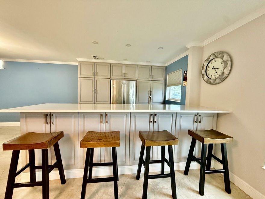 Charming 55+ condo in gated High Point Section 1! This light, ground-floor unit features a fully updated kitchen and both bathrooms, plus maintenance-free living with no stairs. Enjoy resort amenities: heated pool, clubhouse, tennis, bocce, and pickleball. COA covers water, sewer, cable, and internet. Minutes to awesome downtown Fort Pierce dining and the Inlet—visit the south side for great restaurants and beauty, or the pristine north side state park for surfing and untouched nature. Near beautiful beaches!  Laundry available just outside in same building next door over.