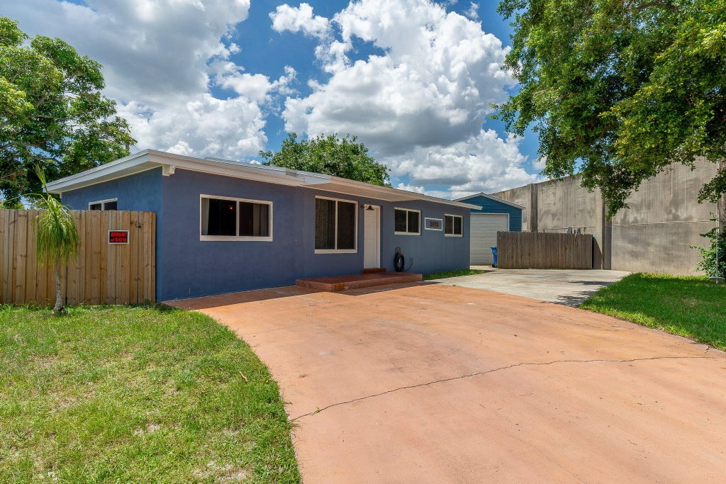 Photo of 1446 W DREW Street, Lantana, FL 33462 (MLS # B26064425)