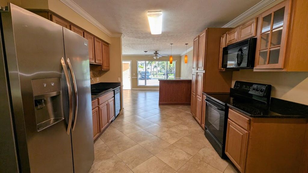 Photo of 830 NW 10th Terrace, Stuart, FL 34994 (MLS # R11073740)
