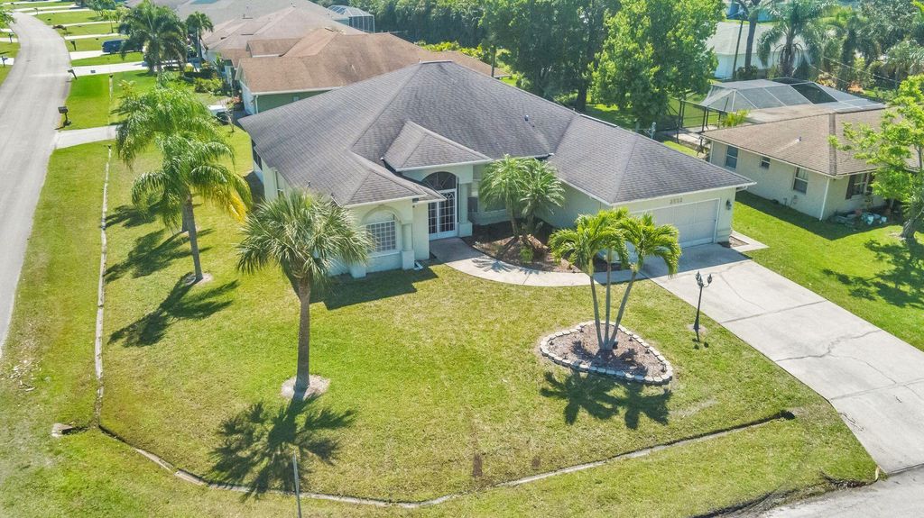 Photo of 2592 SE Calusa Avenue SE, Port Saint Lucie, FL 34952 (MLS # R10968543)