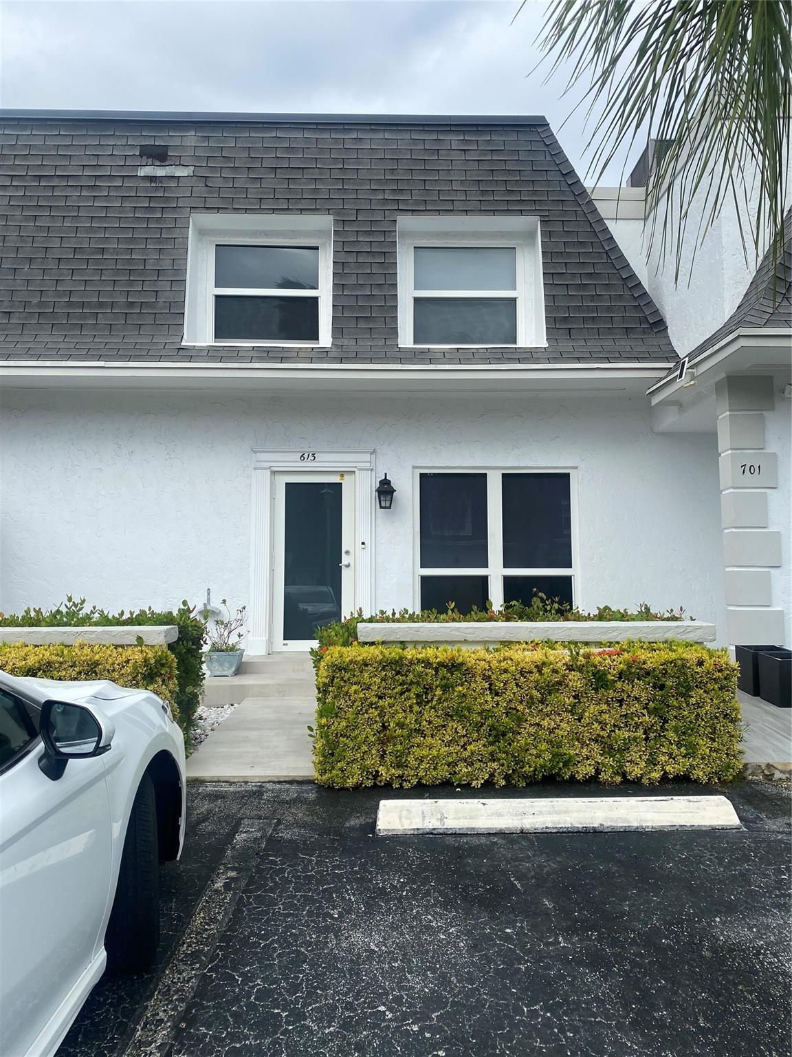 TOTALLY RENOVATED - FULLY FURNISHED, SPACIOUS,WATERFRONT 2-STORY 3 BED 2.1/2 BATH TOWNHOUSE ANNUAL RENTAL IN HIGHLY SOUGHT AFTER THREE ISLANDS COMMUNITY WITH HEATED COMMUNITY POOL, GYM & 2-TENNIS/PICKEL BALL COURTS. WATER VIEWS FROM LARGE, BEAUTIFUL FURNISHED PATIO & 2ND FLOOR BALCONY. BRIGHT MASTER BEDROOM W/LARGE WALK-IN CLOSET & SPECTACULAR WATER VIEW! UPGRADED BATHROOMS & KITCHEN WITH QUARTZ COUNTERTOPS. UPGRRADED APPLIANCES INCLUDING WASHER & DRYER ALL NEW IMPACT WINDOWS & DOORS. GREAT SECURE COMMUNITY MINUTES TO THE BEACH & MAJOR SHOPPING! RENT INCLUDES WATER, CABLE WI-FI, TRASH 2 PARKING SPACES. CANAL FLOWS DIRECT TO INTERCOASTAL - DOCK AVAILABLE FOR USE. TENANTS MUST HAVE GOOD CREDIT HISTORY. PROOF OF INCOME AND OBTAIN RENTERS INSURANCE.