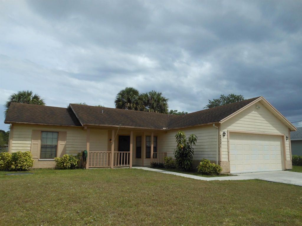 Photo of 2321 SW Frisco Terrace, Port Saint Lucie, FL 34953 (MLS # R11035039)