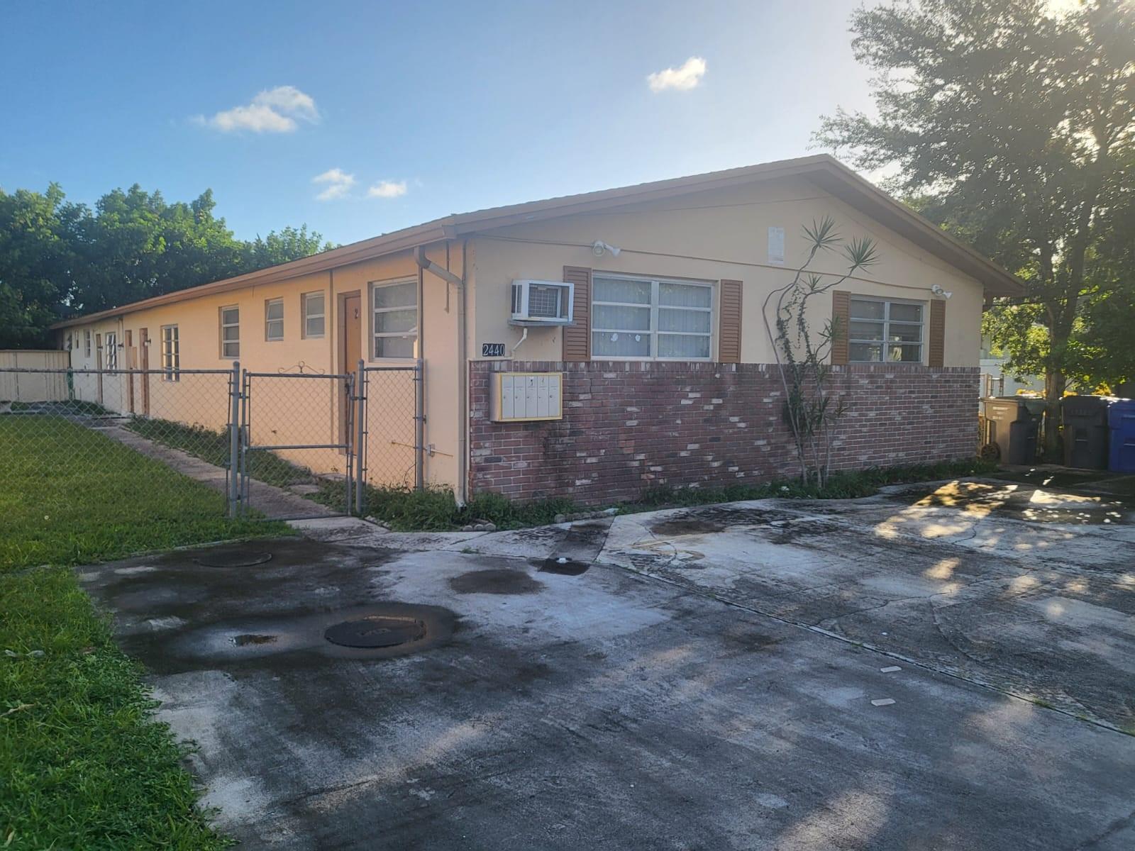 This property is 12 minutes away from Hollywood Beach Broadwalk, 7 minutes from downtown Hollywood area and Young Circle. This property is currently a 5 plex, however the city of Hollywood is requiring to change it into a duplex. The conversion has been approved by the city. Drawings and building permit are readily available and approved by the city. Buyer would be responsible for converting into a a duplex. The property is being delivered to the buyer with the approved drawings and building permit. Building square footage will be adjusted to 2910 sq ft from 3450 sq ft after conversion. An enclosed area of 510 sq ft has to converted back to a patio area therefore adjusting the building sq ft to 2910. Each side will be approximately 1455 sq ft.