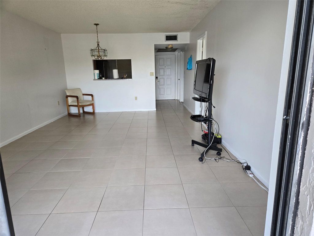 Photo of 1001 Colony Point Circle #305, Pembroke Pines, FL 33026 (MLS # F10554950)