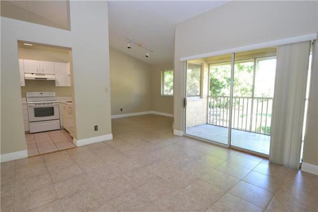 Photo of 910 Coral Club Drive #910, Coral Springs, FL 33071 (MLS # R11159420)