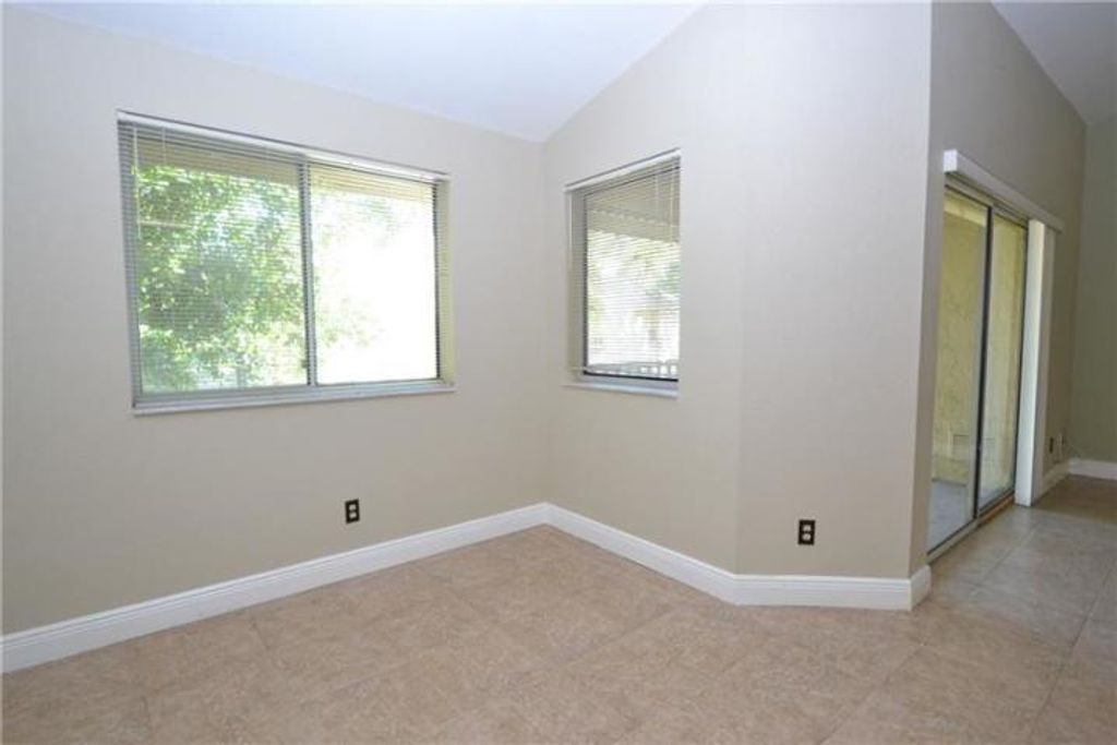 Photo of 910 Coral Club Drive #910, Coral Springs, FL 33071 (MLS # R11159420)