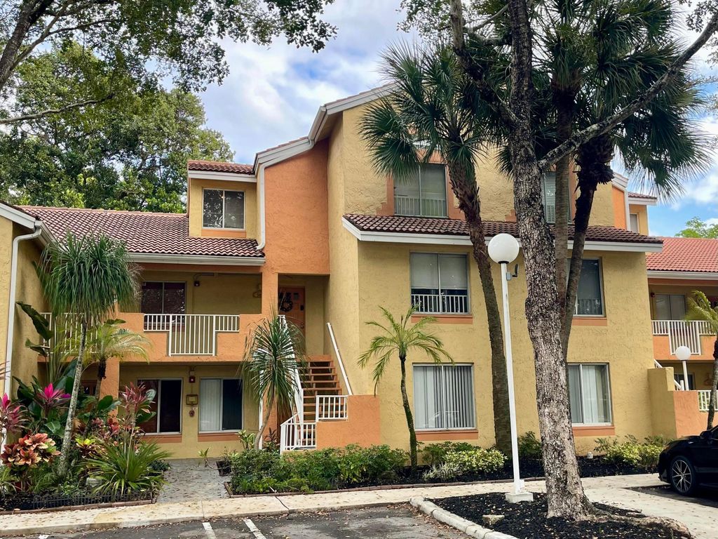 Photo of 910 Coral Club Drive, Coral Springs, FL 33071 (MLS # R11159420)