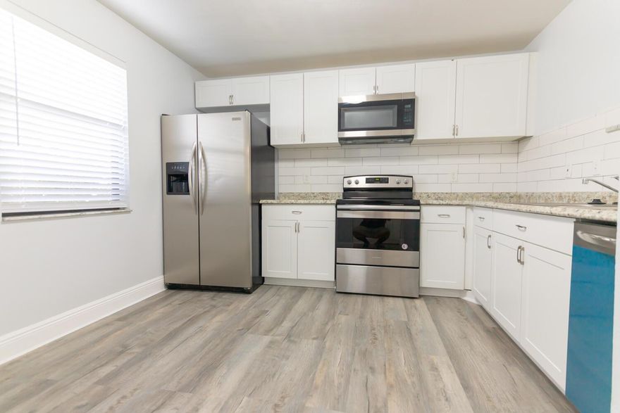 Beautiful condo 1st floor, very confortable, bedrooms are very spacious, master bedroom has shower and bathtub, update kitchen (new dishwasher)  new vinyl flooring, A/C & Water Heather 2021, Washer & Dryer 2022, big storage in the porch, parking space in front of the unit, HOA included basic cable, exterior maintenance and pool. Laundry in unit.  All ages, can be rented immediately.  Conveniently located, walk or ride to Publix, Dollar Store and more.