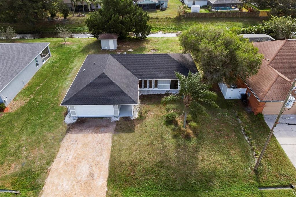 Photo of 714 SW Saragossa Avenue, Port Saint Lucie, FL 34953 (MLS # R10944942)