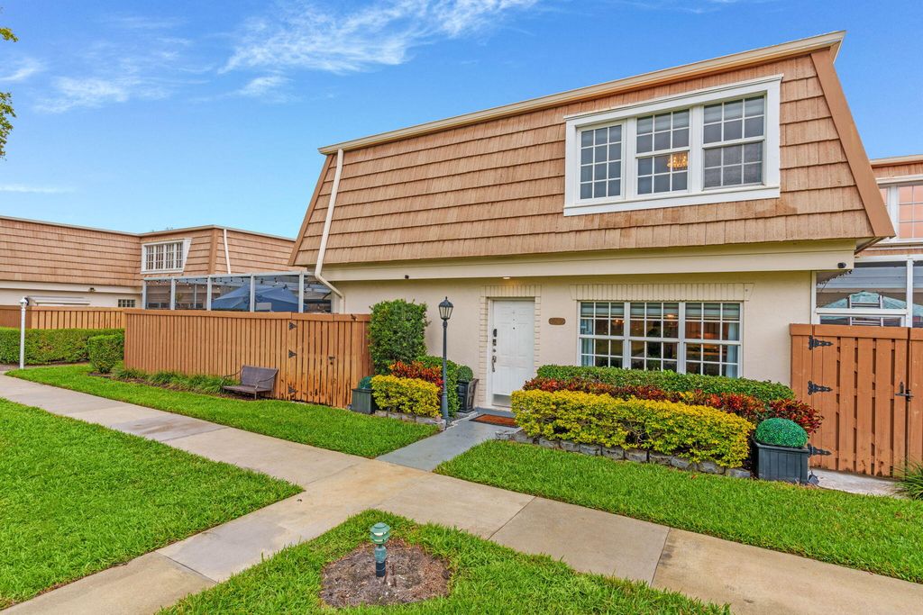 Photo of 11625 Winchester Drive #C, Palm Beach Gardens, FL 33410 (MLS # R11161027)