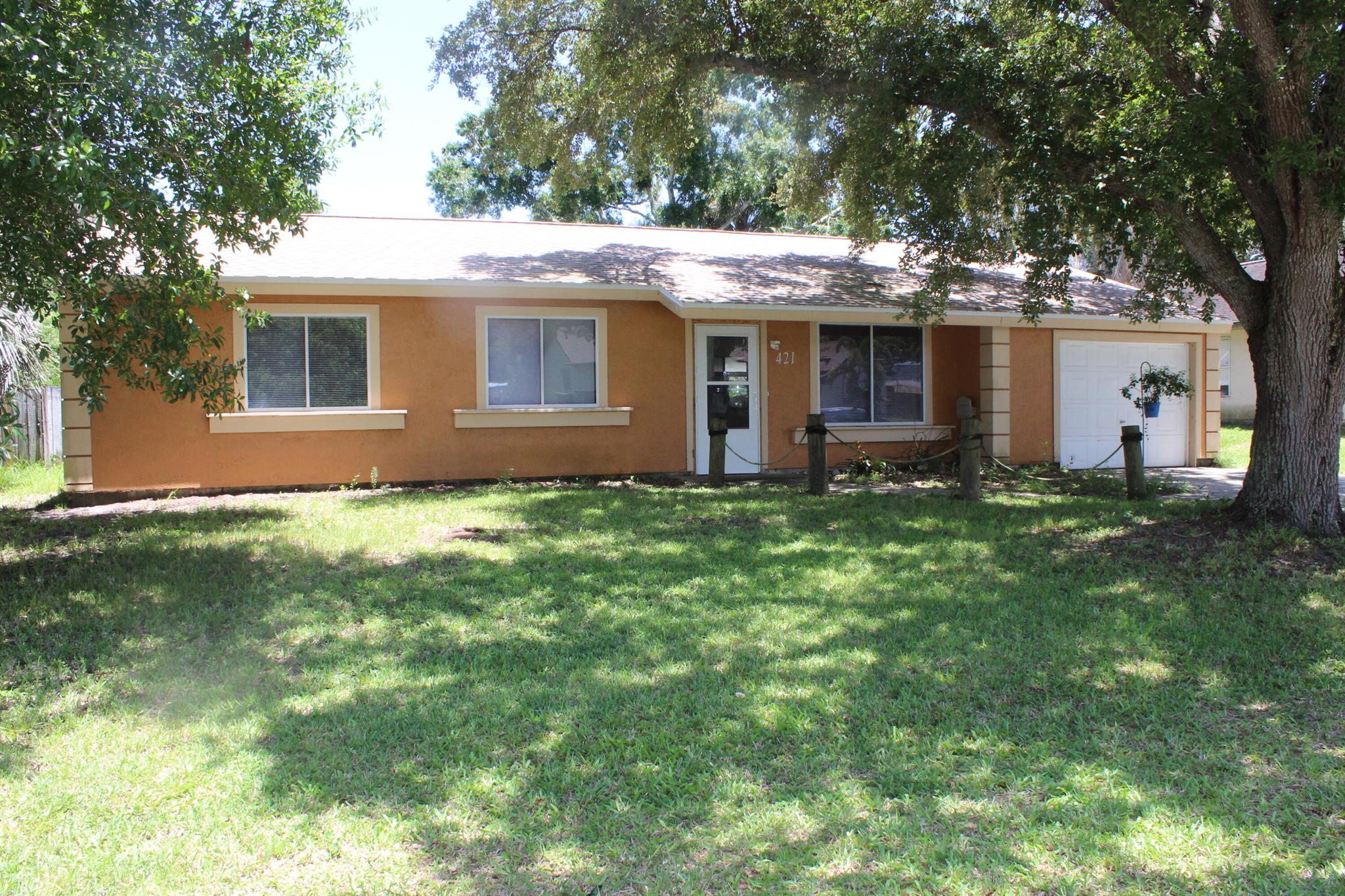 Charming single-family home nestled on a spacious fenced in yard. Enjoy Florida living at its finest with a refreshing screened pool, perfect forrelaxation and entertainment. This 1,176 sq ft residence boasts 3 bedrooms, 2 bathrooms and 1-car garage offering ample space for comfortableliving. Recent upgrades include a new roof, new A/C, and fresh bathroom cabinets. With no HOA required approvals, this property offersfreedom and flexibility. Make this your dream home today! Ideal location just a short drive to Melbourne Beach, about one mile from I-95 exit and conveniently close to shopping, medical centers, and parks. Option to purchase availble.