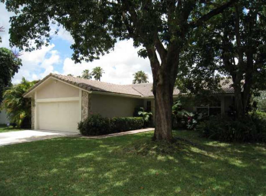Wonderful Single family home in the heart of Coral Springs! 3BR/2BA waterfront pool home with private fenced yard and paver patio. This well-maintained home features a spacious layout with wood and tile flooring throughout - no carpet, freshly painted interior, and IMPACT WINDOWS and French doors. The open kitchen boasts granite countertops and stainless steel appliances. Enjoy a formal dining area, a large covered patio, a built-in outdoor BBQ, and a freeform pool overlooking the lake. Additional highlights include a durable S-tile roof and excellent curb appeal. Located in a desirable neighborhood--this turnkey home is priced to sell and ready for its new owner!