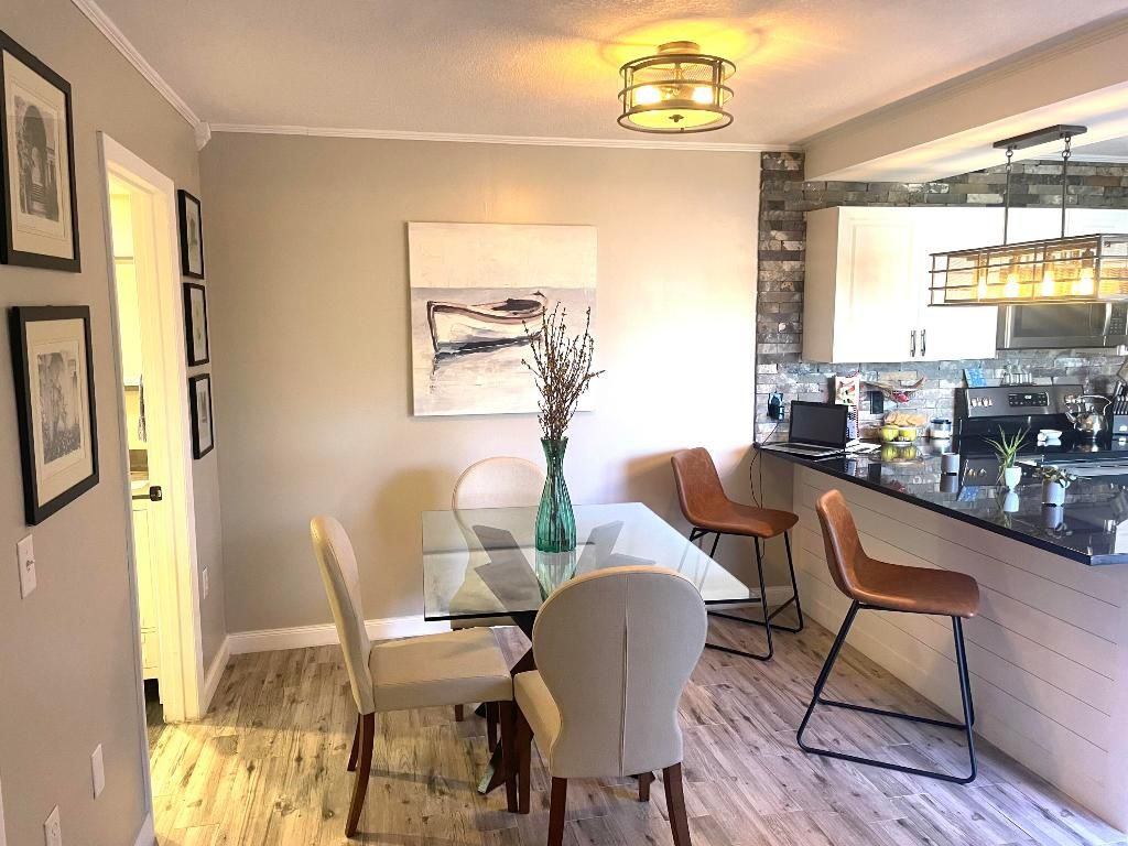 Photo of 3167 Gardens East Drive #A, Palm Beach Gardens, FL 33410 (MLS # R10969048)