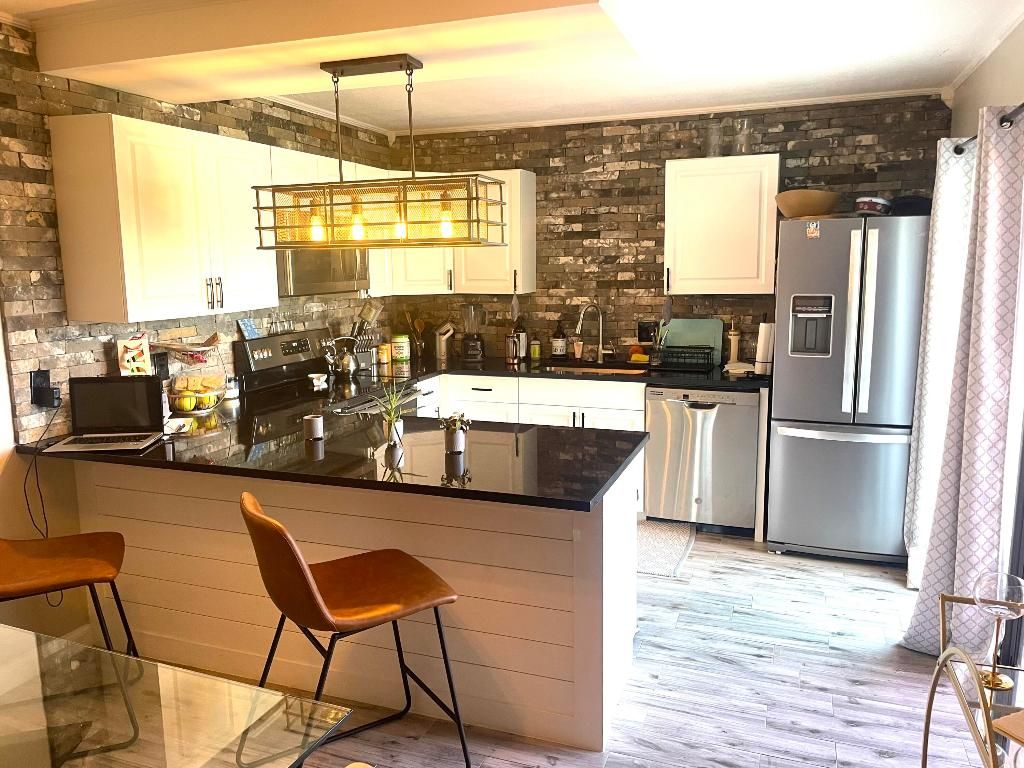 Photo of 3167 Gardens East Drive #A, Palm Beach Gardens, FL 33410 (MLS # R10969048)