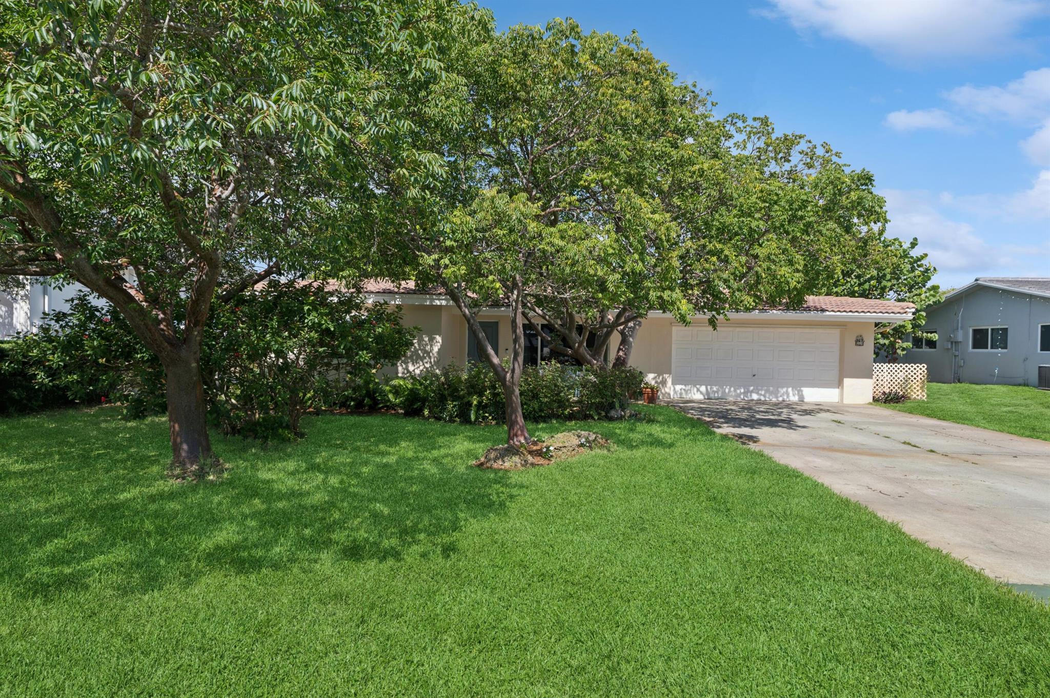 Quiet beautiful Florida neighborhood. Close to downtown, I-95, Boca Regional Hospital, Mizner Park, Brightline Train Station, Boca Raton Public Library. Beautiful big tree lined lot with a fenced in backyard for entertaining. The 4th bedroom is a convertible from the garage area.
