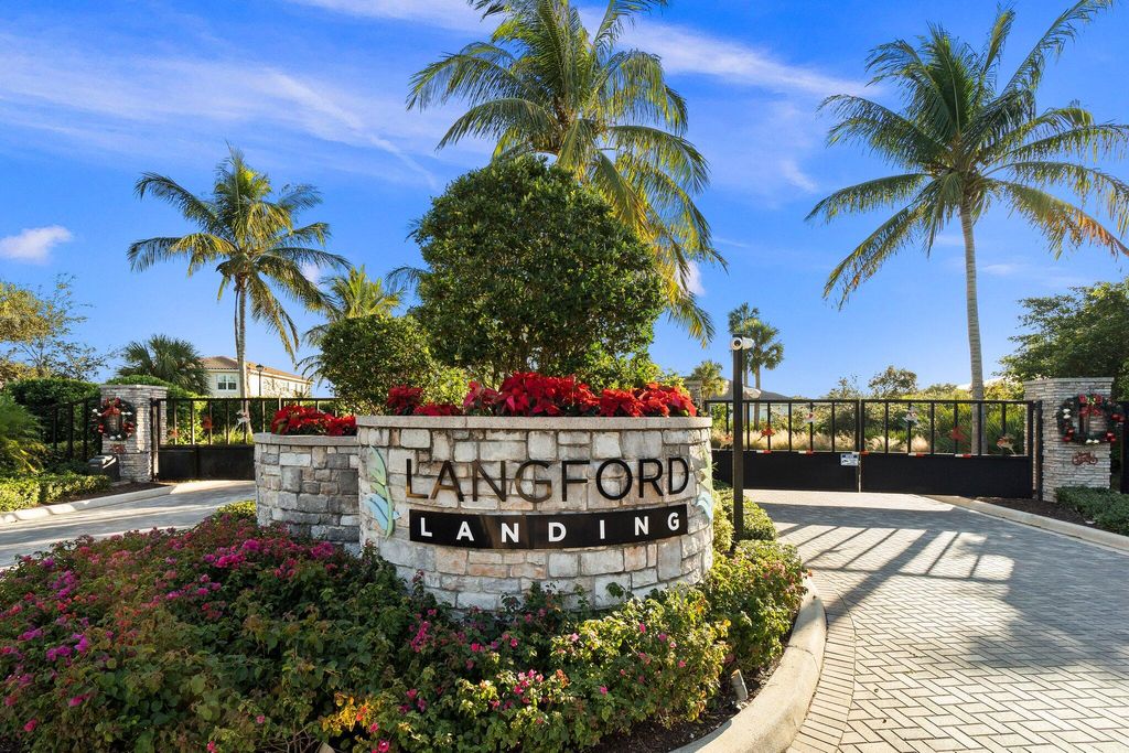 Photo of 2455 NE Evinrude Circle, Jensen Beach, FL 34957 (MLS # R10941048)