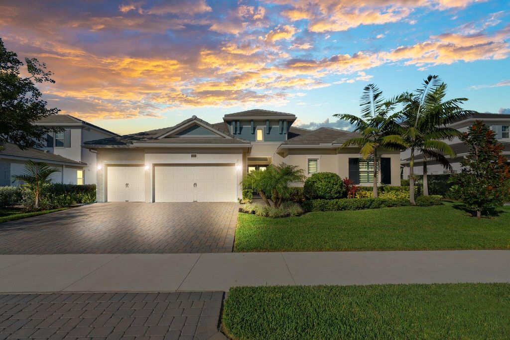 Photo of 2455 NE Evinrude Circle, Jensen Beach, FL 34957 (MLS # R10941048)
