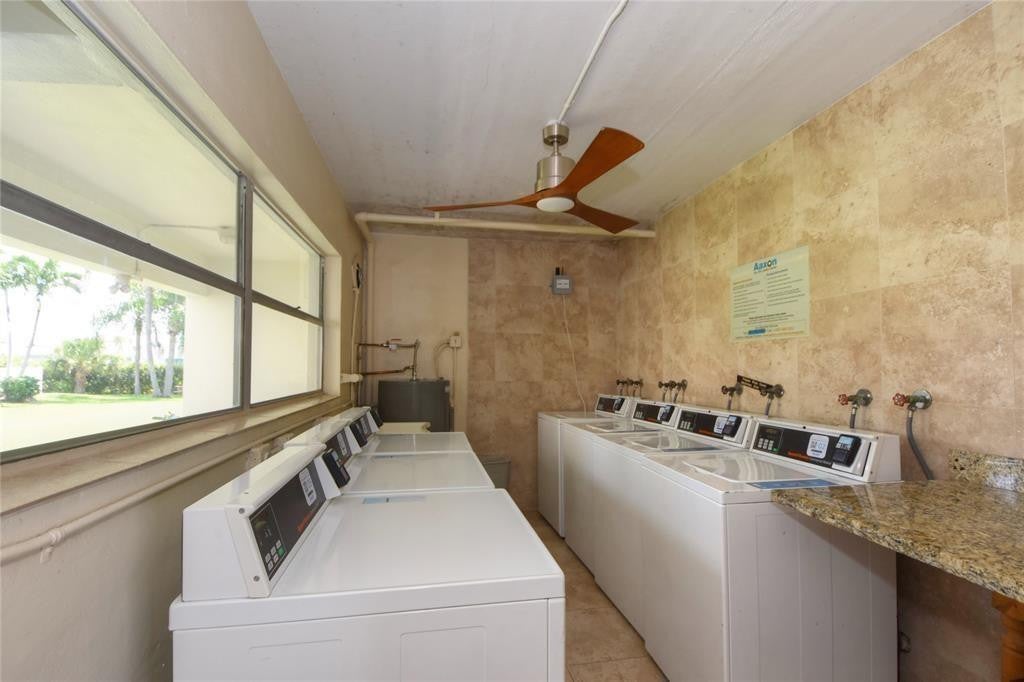 Photo of 4200 CRYSTAL LAKE Drive #212, Deerfield Beach, FL 33064 (MLS # B26078623)