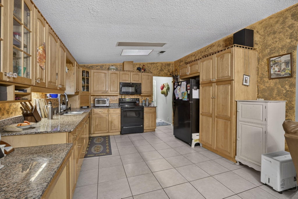 Photo of 15182 Steffen Lane, Loxahatchee Groves, FL 33470 (MLS # B26061078)