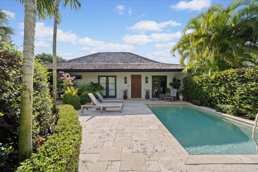 Enter through the secret garden of this sophisticated courtyard bungalow with private heated pool and stunning backyard water views. Marble flooring, vaulted wood-beamed ceilings and hardwood doors throughout. High-end designer finishes make up the dreamy Italian-style kitchen perfect for the most discerning foodies. Natural light brightens every corner of the open space of this immaculately-kept hideaway, which comes complete with impact French doors and windows. Tucked into the exclusive gated enclave of Palm Beach Polo & CC, which offers a host of world-class amenities and is minutes away from WEF, Global, Dressage and International Polo Club.