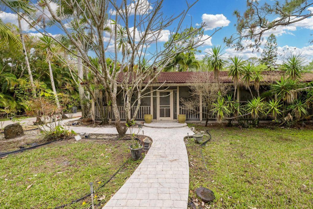 Photo of 13265 N 41st Ln Lane N, The Acreage, FL 33411 (MLS # B26009806)