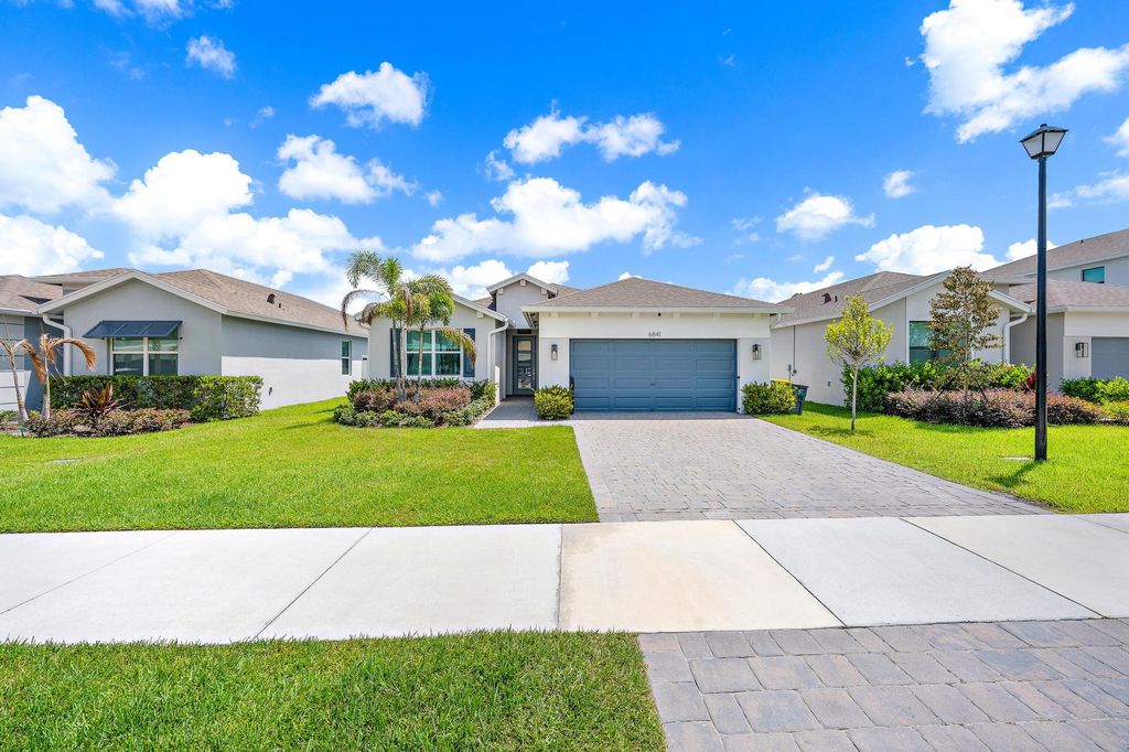 Photo of 6841 SE Pk Trce Drive, Stuart, FL 34997 (MLS # B26042004)