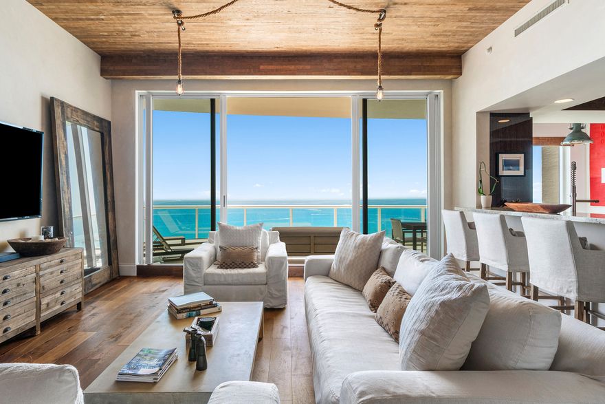 Penthouse residence at the Ritz-Carlton Singer Island available turnkey for seasonal or longer-term lease. Featuring soaring ceilings, designer interior, and a flexible 2-bedroom plus den layout, this decorator published property offers a rare opportunity. Enjoy panoramic views of the Atlantic Ocean, Palm Beach Island, and the Intracoastal. The Ritz-Carlton provides a private beach, resort-style pool, and onsite restaurant, creating a lifestyle of luxury and convenience in one of South Florida's most exclusive addresses.