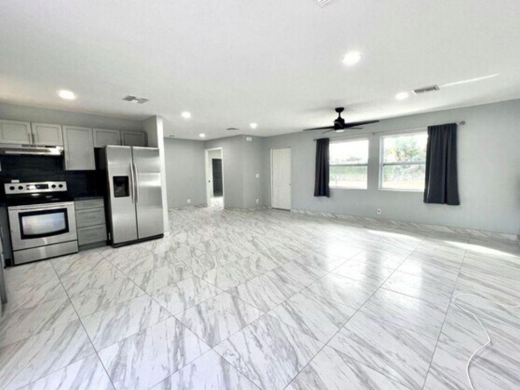 Photo of 1228 Victoria Drive, West Palm Beach, FL 33406 (MLS # R11111044)