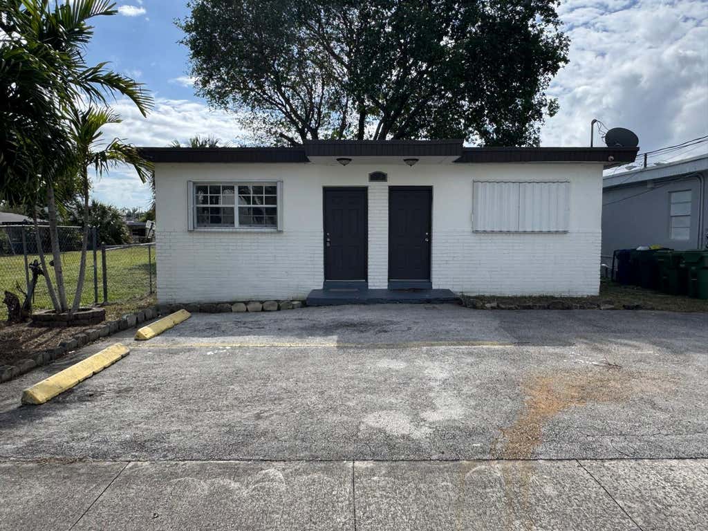 Photo of 1042 Foster Road, Hallandale Beach, FL 33009 (MLS # B26060855)
