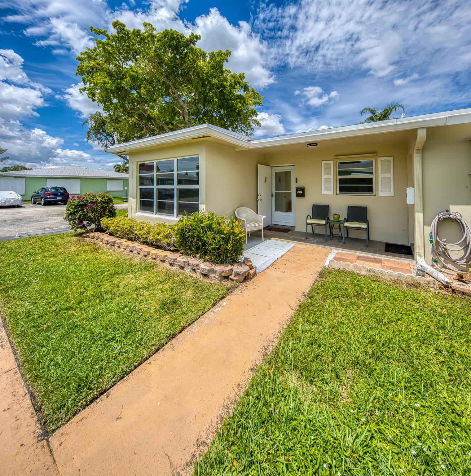 Welcome to your dream villa! This delightful two-bedroom, two-bathroom residence has been meticulously updated (including All Impact Windows, central A/C~5years new) to offer modern comfort in a serene setting. The spacious open floor plan features a bright living area, perfect for entertaining or relaxing. Enjoy cooking in the contemporary kitchen equipped with modern appliances and ample storage. Step outside to a private patio, ideal for morning coffee or evening gatherings. Located in a prime area, you'll have easy access to shopping, dining, and recreational activities. This villa is perfect for those seeking a low-maintenance lifestyle without compromising quality. Don't miss this opportunity!