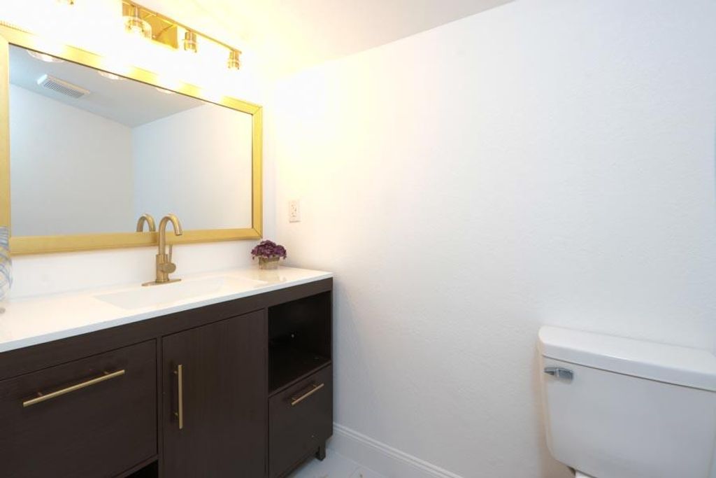 Photo of 1661 W 12th Court, Riviera Beach, FL 33404 (MLS # B26025718)