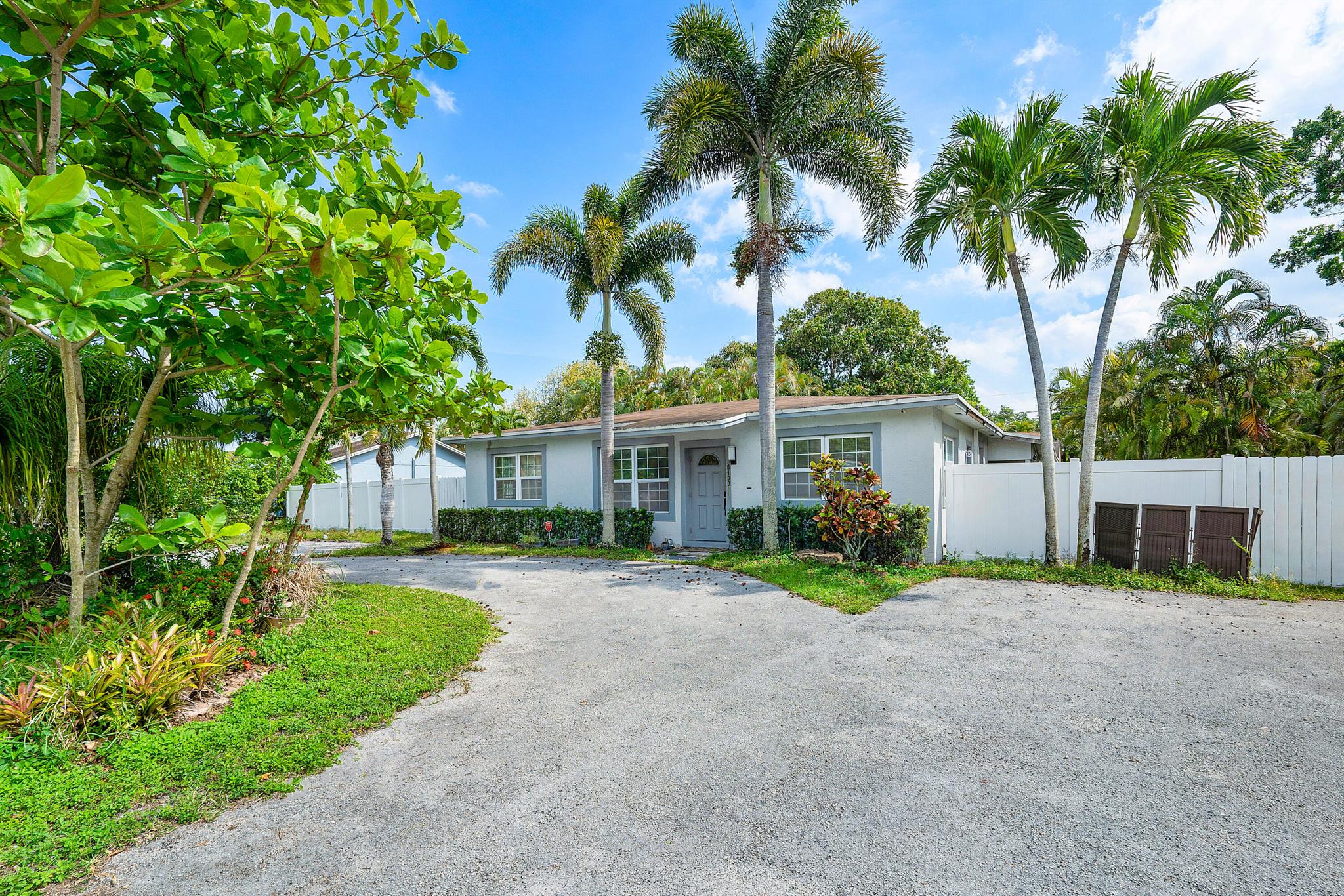 Welcome to this spacious 6-bedroom, 3-bath residence nestled on an oversized lot spanning over half an acre, one of the largest parcels in Margate. The property is graced with two mature mango trees, lending charm and lush greenery to the expansive backyard. Inside, enjoy an updated kitchen boasting stainless steel appliances and sleek finishes, blending modern convenience with bright, open living space A beautifully designed circular driveway adds curb appeal and offers effortless access and parking. With six bedrooms, three fully renovated bathrooms, and an ideal location near Margate amenities and major roadways, this home is exceptional for large families or those who love entertaining and outdoor living.