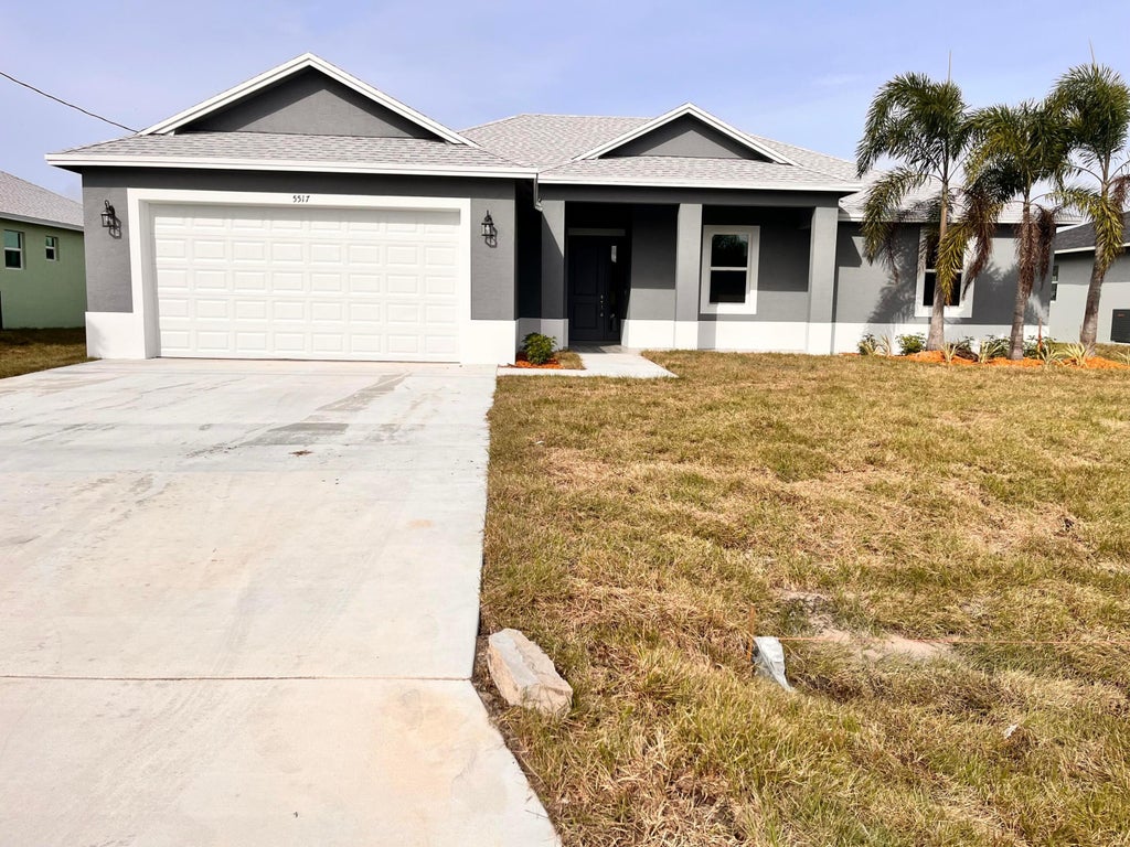 Photo of 5517 NW Downs Street, Port Saint Lucie, FL 34986 (MLS # R10948990)
