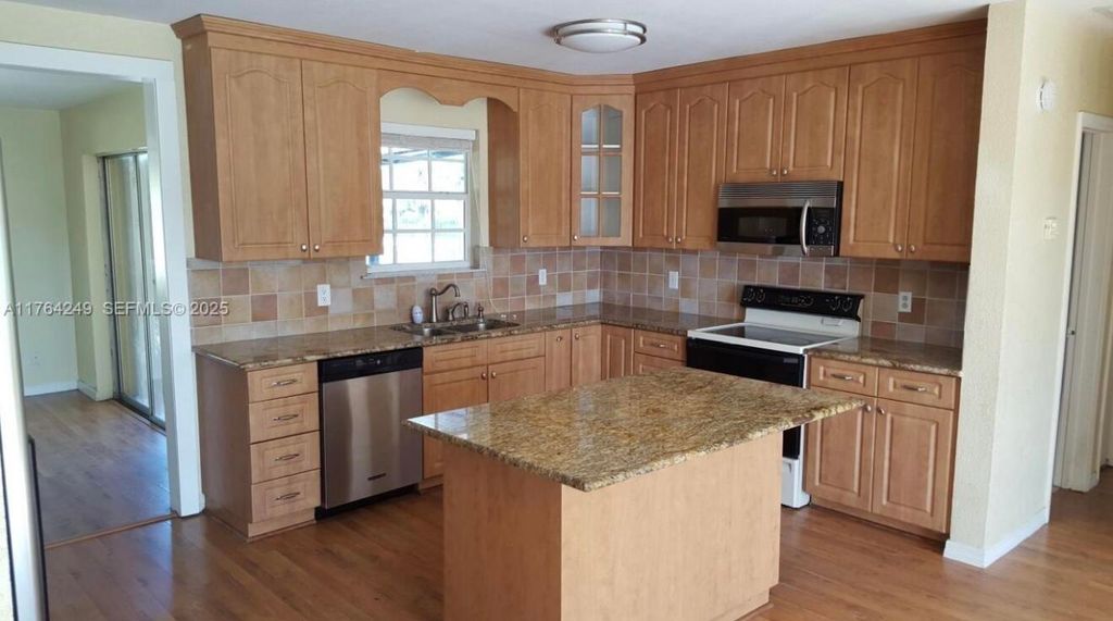 Photo of 3961 Park Lane #,Front, Palm Springs, FL 33406 (MLS # R11151143)