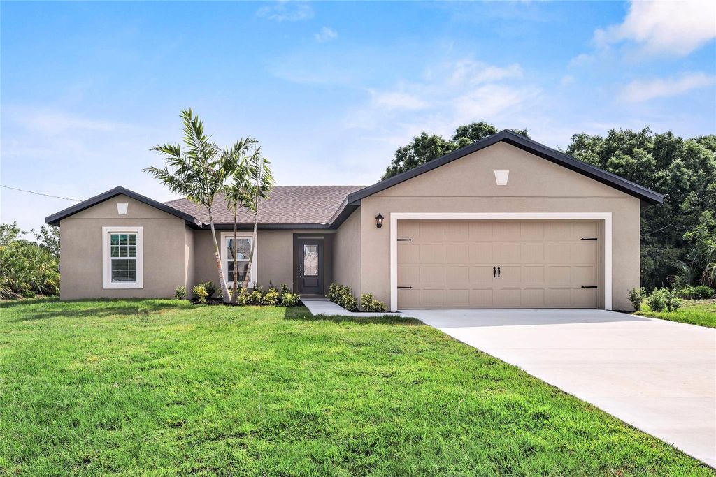 Photo of 3910 SW Brunswick Street, Port Saint Lucie, FL 34953 (MLS # F10398185)
