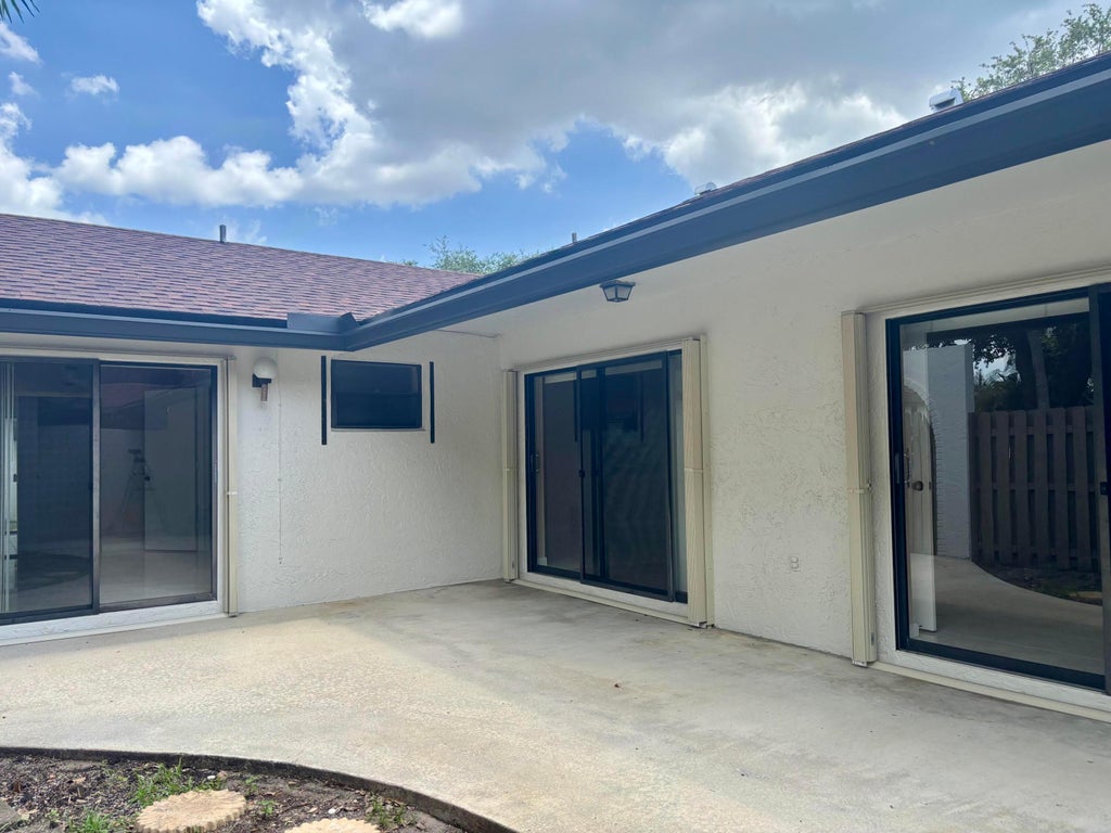 Photo of 23343 SW 54th Way #A, Boca Raton, FL 33433 (MLS # B26043796)