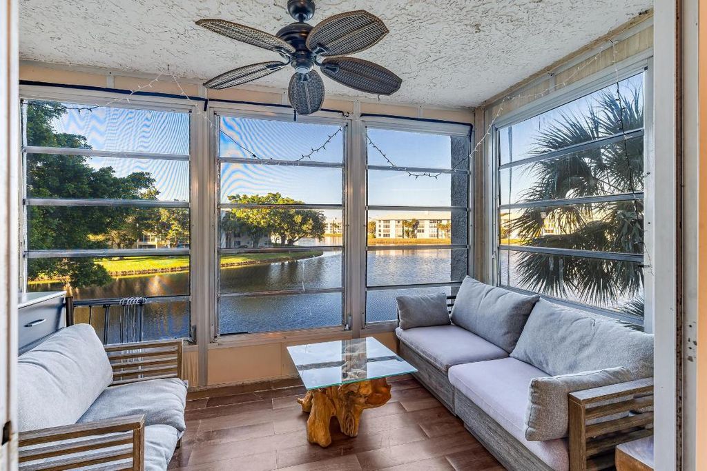 Photo of 9235 Lagoon Place #302, Davie, FL 33324 (MLS # R11155097)