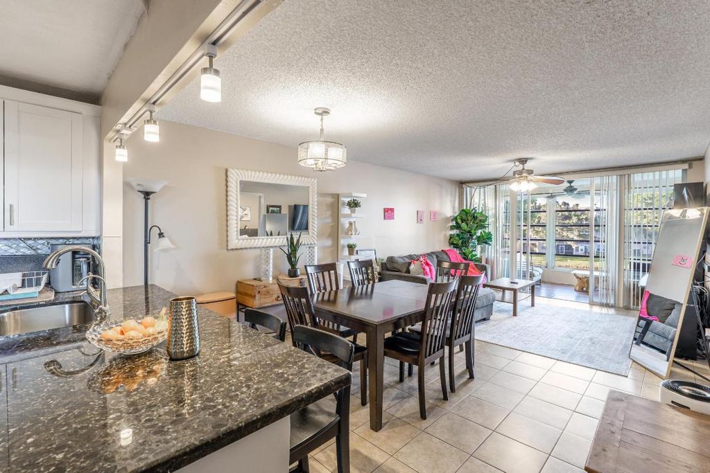 Photo of 9235 Lagoon Place #302, Davie, FL 33324 (MLS # R11155097)