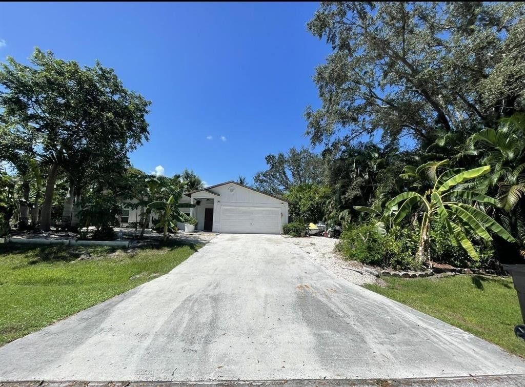 Photo of 885 SW Andrew Road, Port Saint Lucie, FL 34953 (MLS # F10493677)