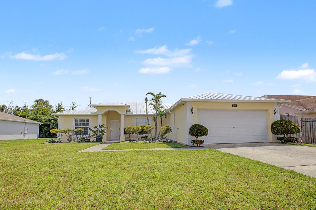 Photo of 2585 SE LAKEWOOD Street, Port Saint Lucie, FL 34952 (MLS # B26067738)