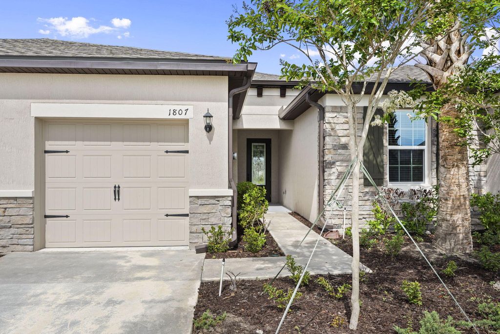 Photo of 1807 Celebration Drive, Fort Pierce, FL 34947 (MLS # B26034484)