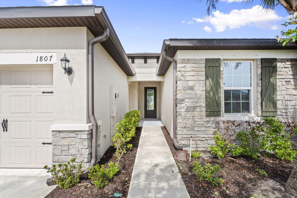 Photo of 1807 Celebration Drive, Fort Pierce, FL 34947 (MLS # B26034484)