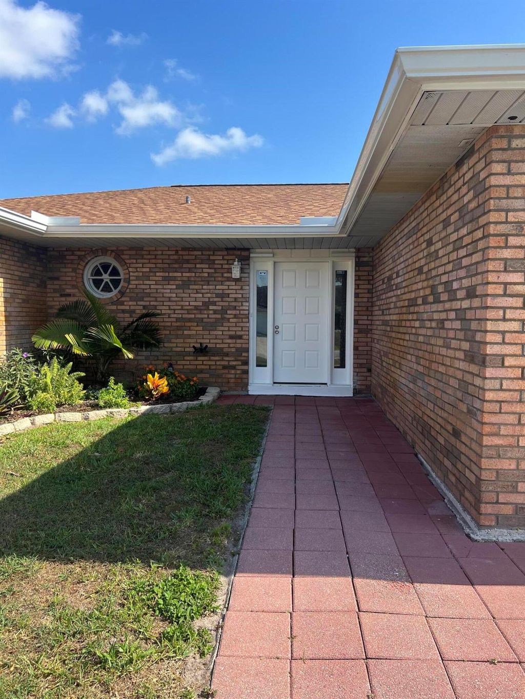 Photo of 761 SW Dolores Avenue, Port Saint Lucie, FL 34953 (MLS # R10987945)