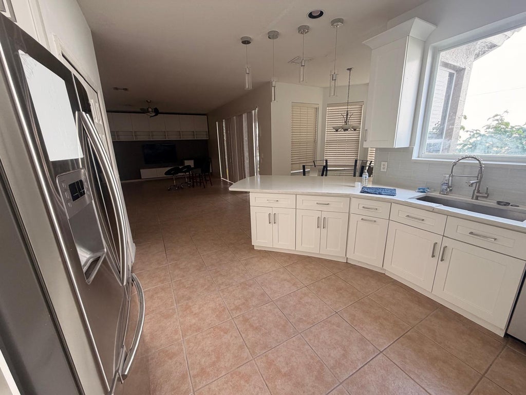 Photo of 1226 Avondale Lane, West Palm Beach, FL 33409 (MLS # B26045643)