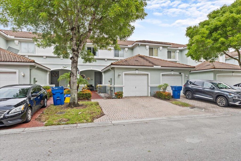 Photo of 2227 Oakmont Drive, Riviera Beach, FL 33404 (MLS # R11159323)